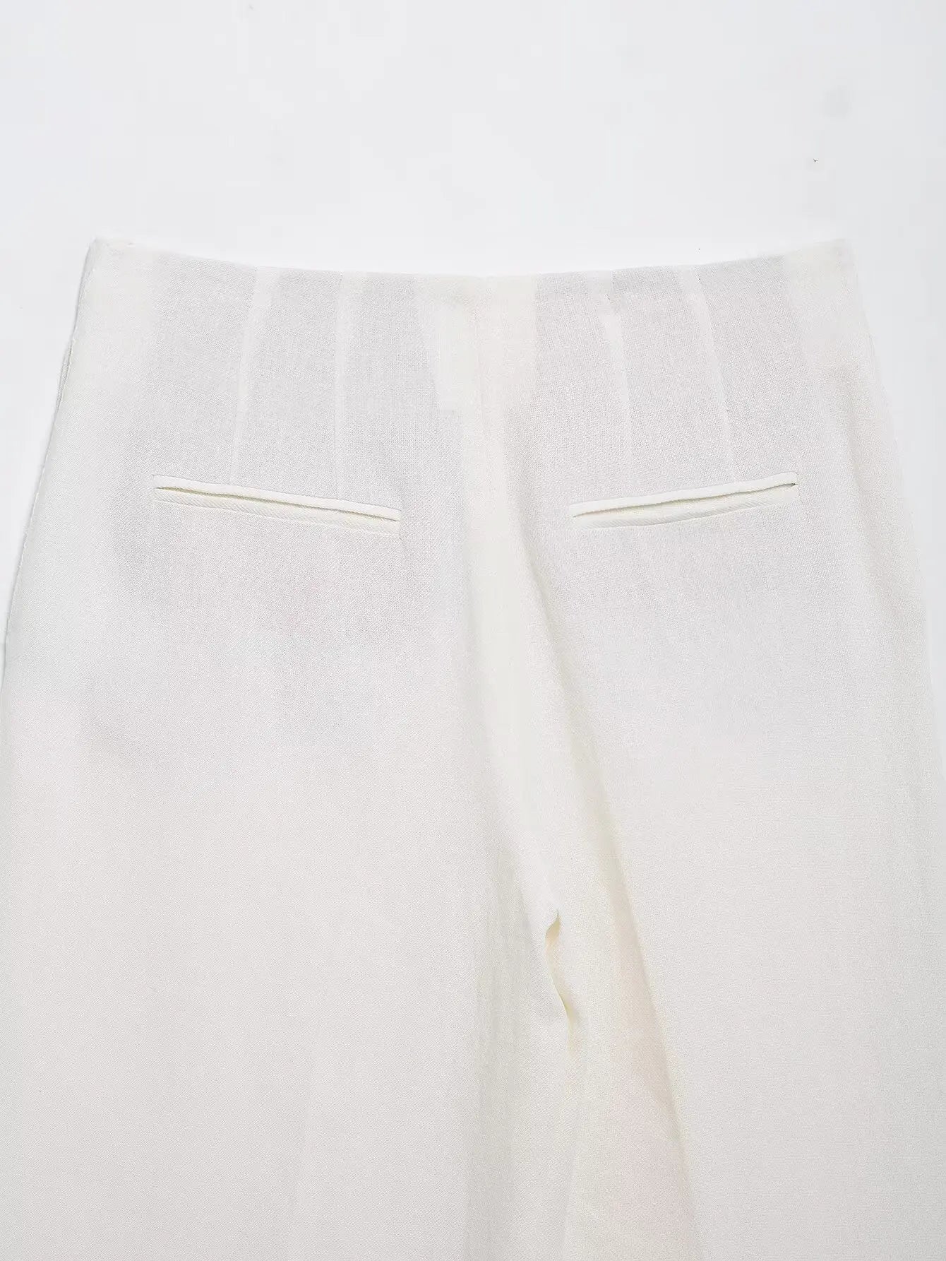 طقم نسائي ربيعي أنيق من HH، يتكون من سترة بيضاء بياقة مطوية وأكمام طويلة وأربطة + بنطلون طويل بسحاب وخصر مرتفع.