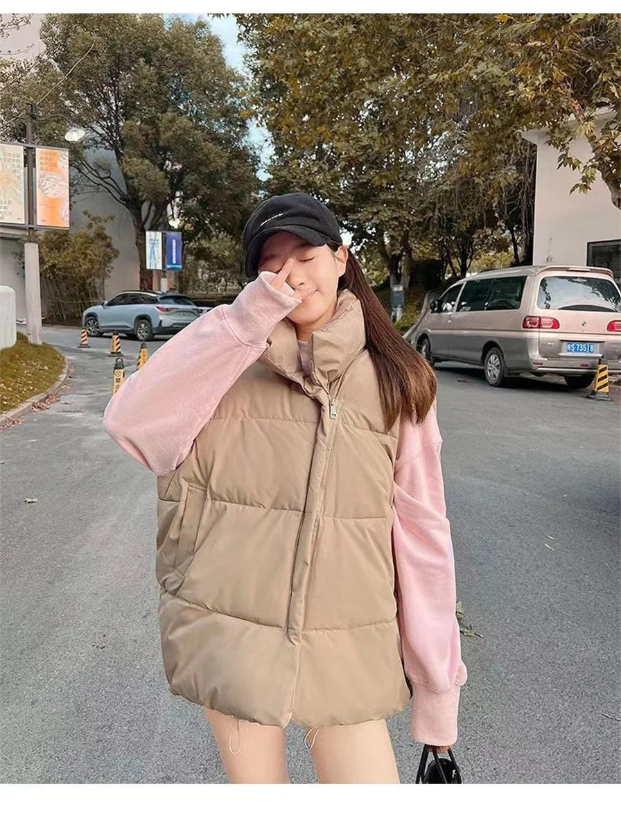 أزياء نسائية خريفية جديدة 2024 معاطف أنيقة بياقة واقفة ودافئة ملابس خارجية كاجوال بحزام بدون أكمام سترات شتوية نسائية