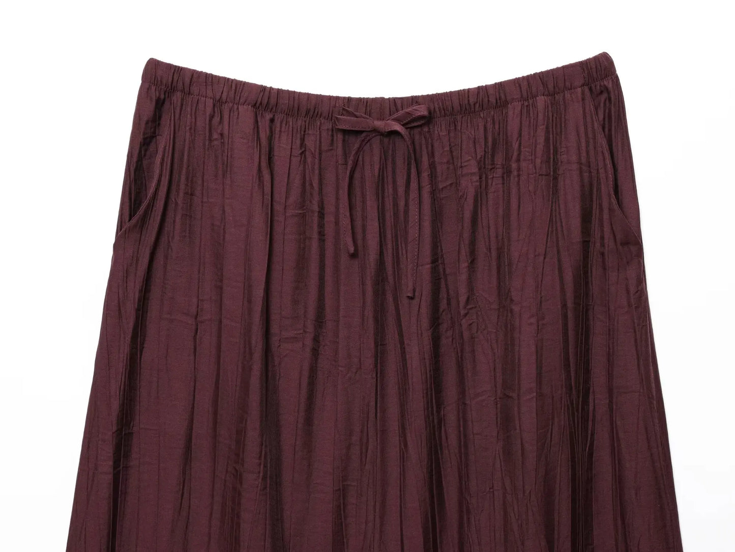 2025 WOMAN fashion European and American style summer new wrinkle effect midi skirt chic bow decorative casual skirt Mujer.