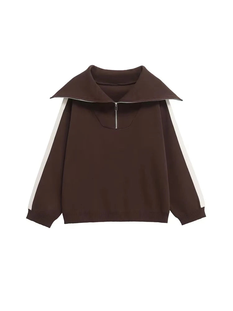 طقم نسائي أنيق من قطعتين، سترة محبوكة مخططة من الجانب وبنطلون مستقيم بخصر مرن عالي، زي نسائي غير رسمي