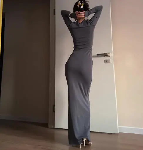 فساتين نسائية ربيع وخريف 2025 موضة جديدة مثيرة نحيفة تعانق الورك مريحة بلون سادة فستان طويل غير رسمي برقبة مستديرة