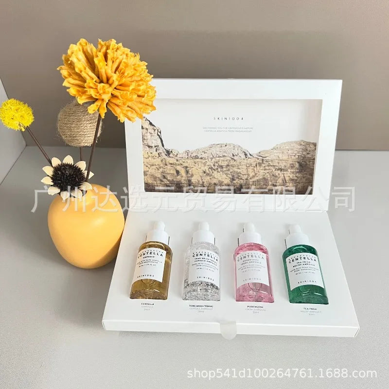 مجموعة العناية بالوجه من Skin1004 Centella Asiatica Essence Limited Edition، مجموعة مهدئة بأربعة ألوان للعناية بالبشرة من Angel