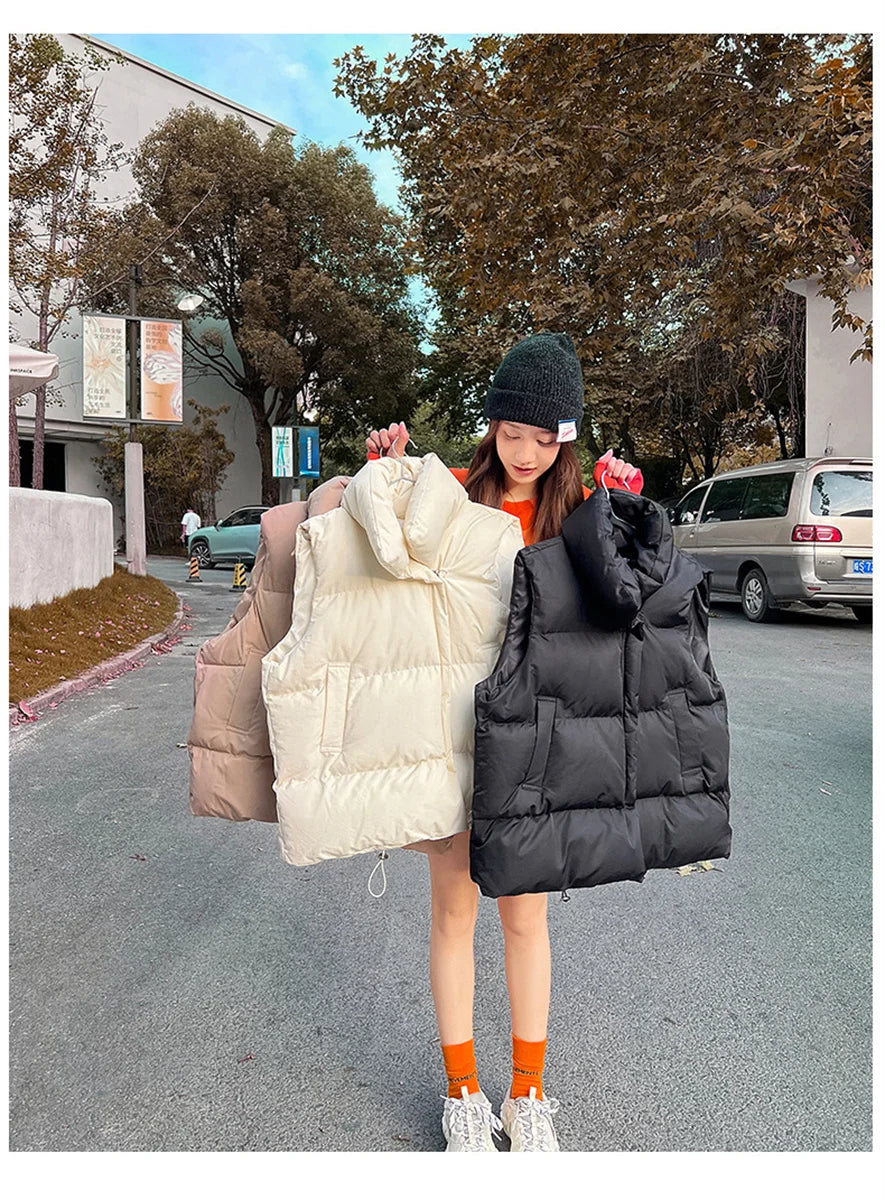 أزياء نسائية خريفية جديدة 2024 معاطف أنيقة بياقة واقفة ودافئة ملابس خارجية كاجوال بحزام بدون أكمام سترات شتوية نسائية