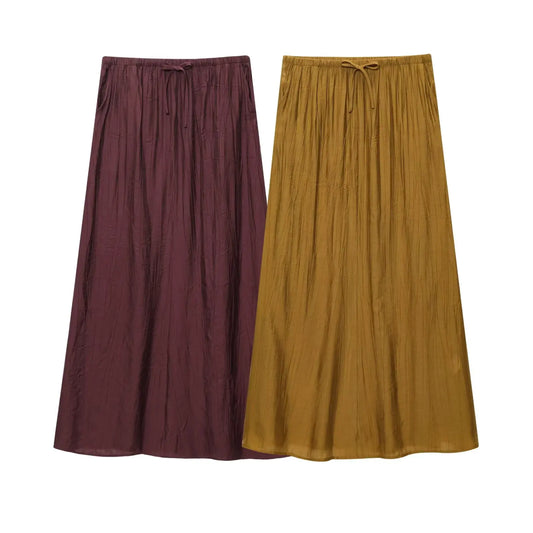 2025 WOMAN fashion European and American style summer new wrinkle effect midi skirt chic bow decorative casual skirt Mujer.