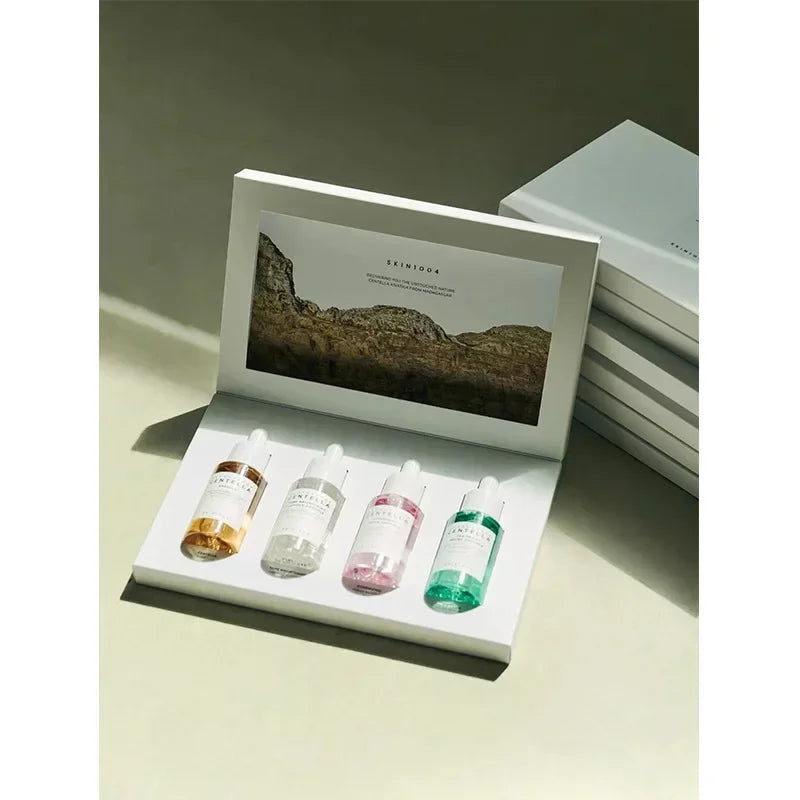 مجموعة العناية بالوجه من Skin1004 Centella Asiatica Essence Limited Edition، مجموعة مهدئة بأربعة ألوان للعناية بالبشرة من Angel