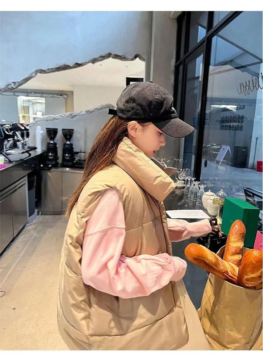 أزياء نسائية خريفية جديدة 2024 معاطف أنيقة بياقة واقفة ودافئة ملابس خارجية كاجوال بحزام بدون أكمام سترات شتوية نسائية