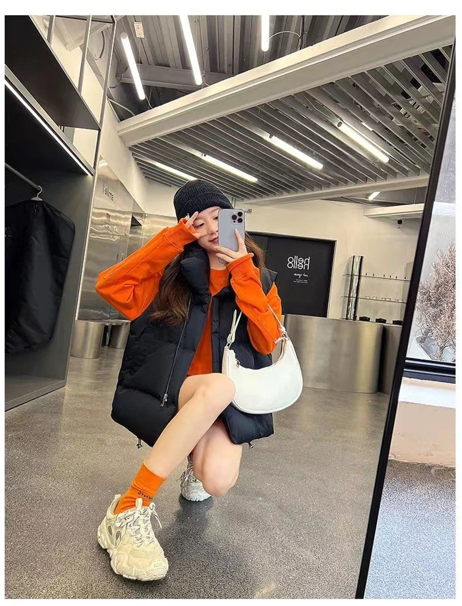 أزياء نسائية خريفية جديدة 2024 معاطف أنيقة بياقة واقفة ودافئة ملابس خارجية كاجوال بحزام بدون أكمام سترات شتوية نسائية