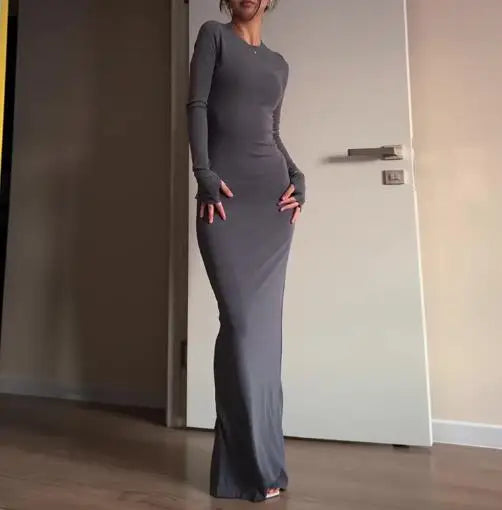 فساتين نسائية ربيع وخريف 2025 موضة جديدة مثيرة نحيفة تعانق الورك مريحة بلون سادة فستان طويل غير رسمي برقبة مستديرة