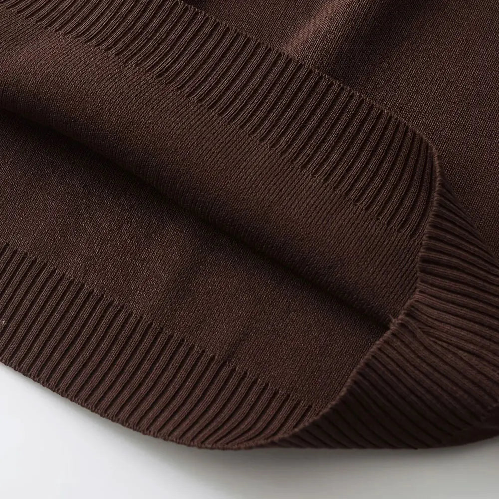 طقم نسائي أنيق من قطعتين، سترة محبوكة مخططة من الجانب وبنطلون مستقيم بخصر مرن عالي، زي نسائي غير رسمي