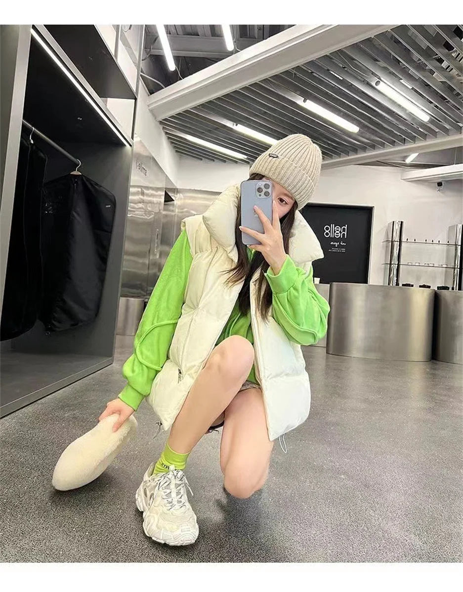 أزياء نسائية خريفية جديدة 2024 معاطف أنيقة بياقة واقفة ودافئة ملابس خارجية كاجوال بحزام بدون أكمام سترات شتوية نسائية