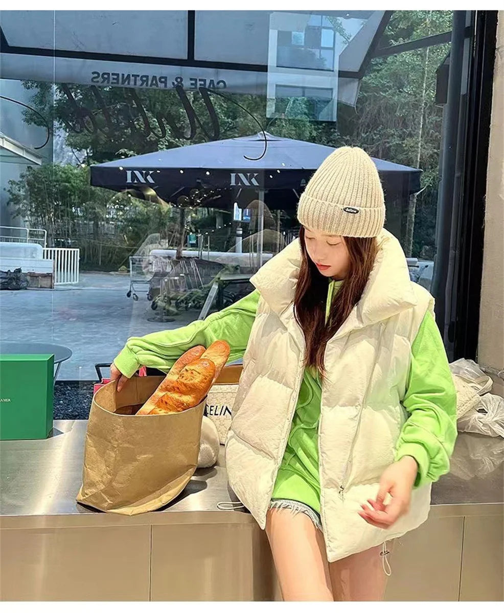 أزياء نسائية خريفية جديدة 2024 معاطف أنيقة بياقة واقفة ودافئة ملابس خارجية كاجوال بحزام بدون أكمام سترات شتوية نسائية