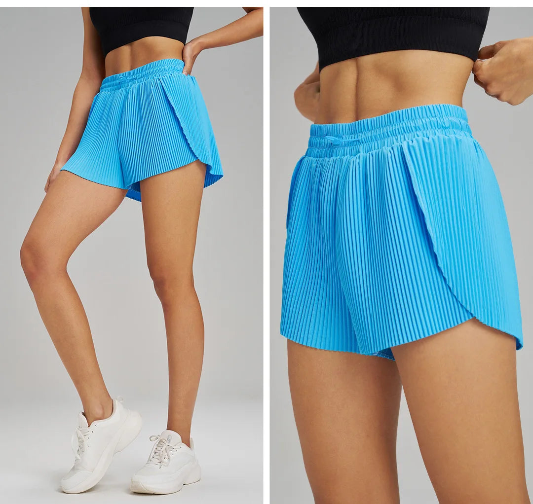 شورت رياضي للياقة البدنية في الهواء الطلق قابل للتنفس وسريع الجفاف شورت فضفاض بطول ثلاثة أرباع للنساء