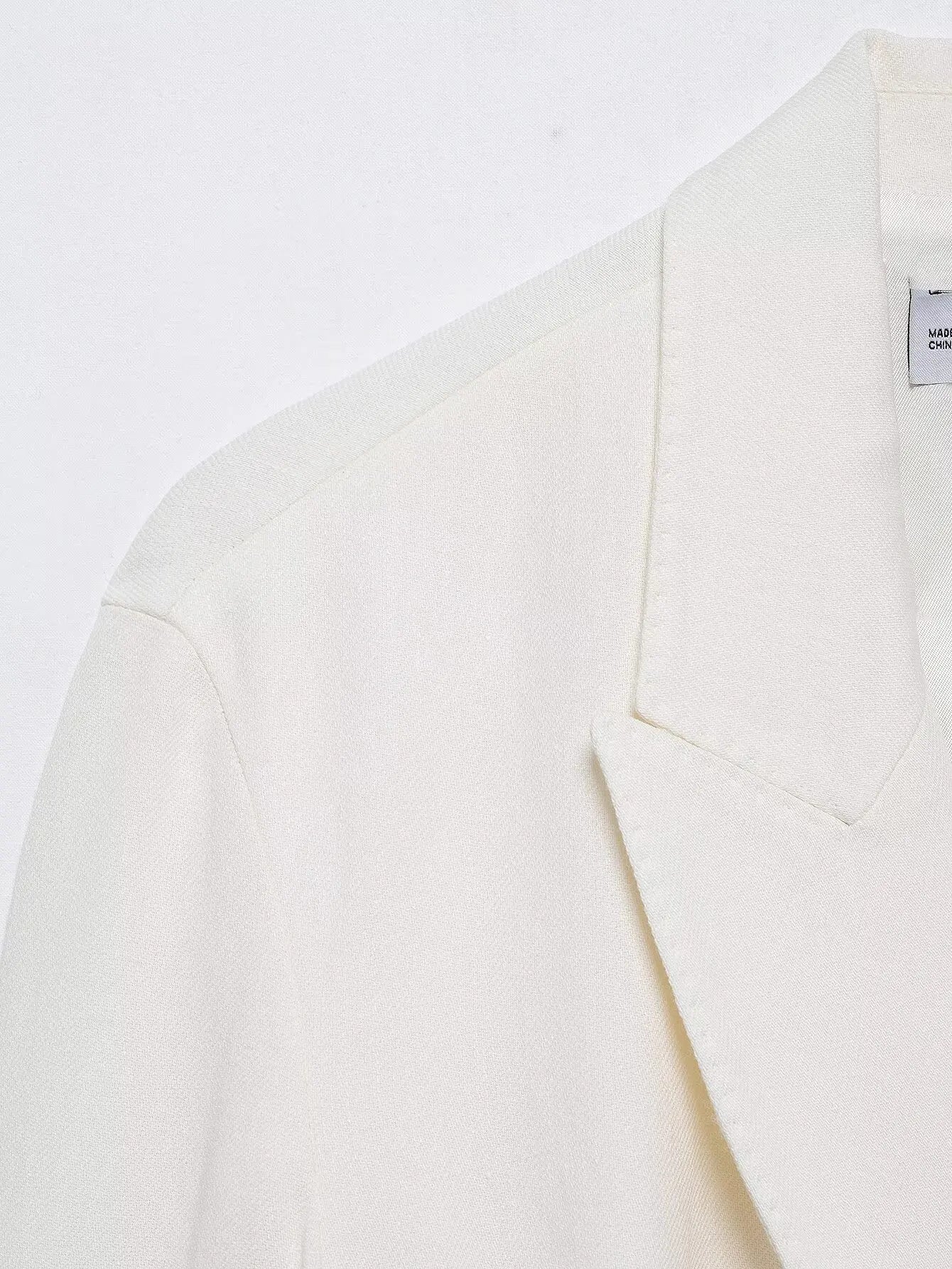 طقم نسائي ربيعي أنيق من HH، يتكون من سترة بيضاء بياقة مطوية وأكمام طويلة وأربطة + بنطلون طويل بسحاب وخصر مرتفع.