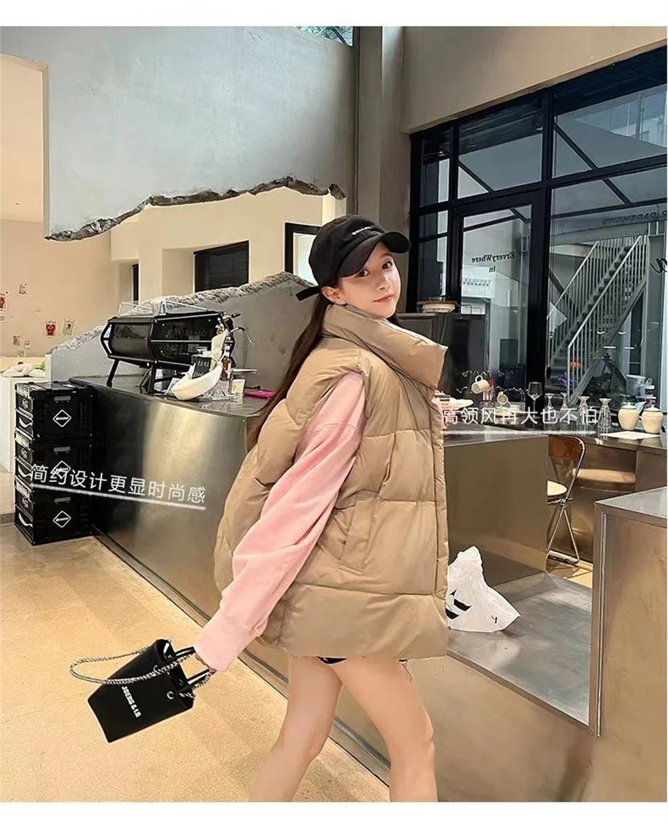 أزياء نسائية خريفية جديدة 2024 معاطف أنيقة بياقة واقفة ودافئة ملابس خارجية كاجوال بحزام بدون أكمام سترات شتوية نسائية