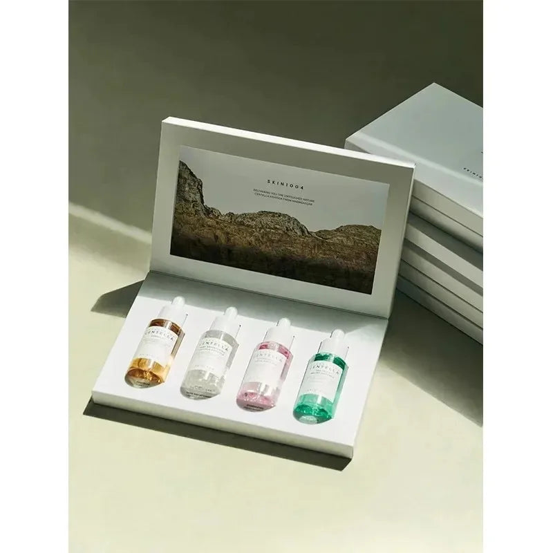 مجموعة العناية بالوجه من Skin1004 Centella Asiatica Essence Limited Edition، مجموعة مهدئة بأربعة ألوان للعناية بالبشرة من Angel
