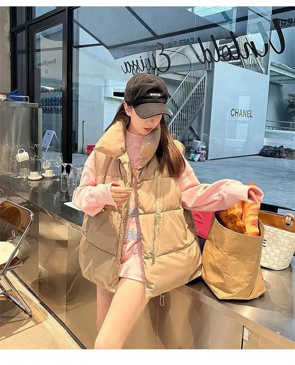 أزياء نسائية خريفية جديدة 2024 معاطف أنيقة بياقة واقفة ودافئة ملابس خارجية كاجوال بحزام بدون أكمام سترات شتوية نسائية