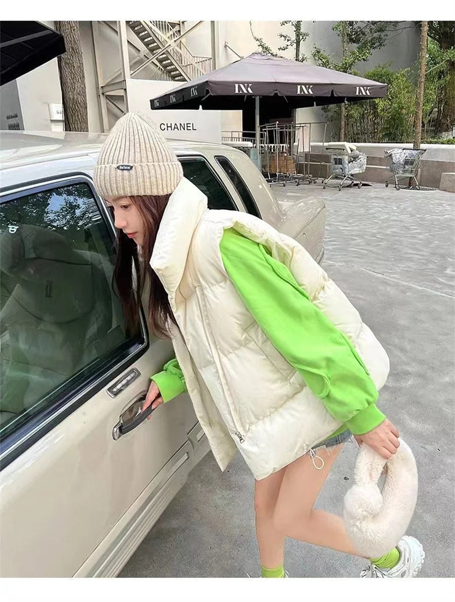 أزياء نسائية خريفية جديدة 2024 معاطف أنيقة بياقة واقفة ودافئة ملابس خارجية كاجوال بحزام بدون أكمام سترات شتوية نسائية